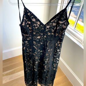 Brand new black lace with nude underlining midi cocktail dress